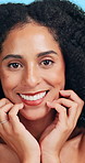 Skincare, beauty and woman in studio with natural, cosmetics or facial glow for confidence. Makeup, smile and portrait of female person with dermatology for wellness by blue background in Colombia.