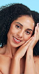 Skincare, cosmetics and face of woman in studio with natural beauty, makeup or facial glow. Confident, smile and portrait of female person with cosmetology for wellness by blue background in Colombia