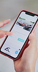Hands, scroll and woman in lounge, phone screen for travel website and vacation destination. Home, sign up or person on sofa, tech or booking for holiday location, hotel review or reservation options