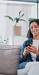Funny, phone and woman on sofa, typing and relax for comfort, weekend break and humor. Laughing, mobile user and person in home, happiness and website info with online comedy video, chatting or tech