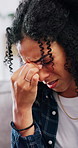 Headache, pain and woman in home, burnout and exhausted with fatigue, tension and stress. Apartment, pressure and person in lounge, migraine and dizzy with massage temple, brain fog and frustrated