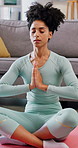 Yoga, breath and woman with meditation in home, spiritual balance or body awareness practice for zen. Holistic, mindfulness or person with prayer hands for inner peace, mental health or stress relief