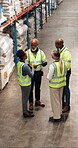 Logistic, review or people at depot with tablet, team schedule or stock control in supply chain. Distribution, discussion or courier staff with tech, inventory management or coordination in warehouse