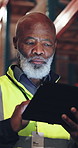 Tablet, mature and black man in warehouse for distribution schedule, shipping info and stock update. Storage, logistics and supervisor with tech, inventory control and supply chain management