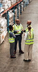 Logistics, review or people at depot with tablet, schedule update or stock control in supply chain. Above, discussion or courier staff with tech, inventory management or coordination for distribution