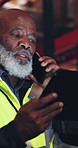 Logistics, man and tablet in warehouse with phone call, feedback or supervisor tracking stock export. Night, mature black person or manager talk with tech, contact or update for shipping distribution