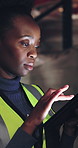Woman, typing and supply chain in warehouse with tablet, report or compliance for quality assurance. Black person, scroll and tech with online checklist, inventory management and update for shipping.