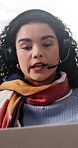 Customer service, laptop and remote work with woman in home living room for feedback or solution. Computer, explain and headset with support person in apartment for video call or virtual assistance