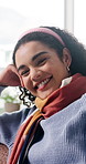 Wellness, face and woman in house with laugh, positive attitude or chill on weekend break. Happiness, portrait or female person in home with good mood, confidence and satisfaction in free time.