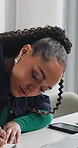 Woman, writing or research with book in office for schedule planning, agenda or tasks. Female person, planner or taking notes with laptop, notebook or diary for reminder or project ideas in workplace