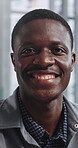 Internship, happy or black man in agency with face, experience or ambition in advertisement industry. Smile, portrait or marketing clerk with confidence, career growth or about us as campaign planner