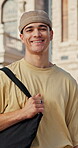College, face or man on campus with bag, knowledge or scholarship in study opportunity. Happy, education or student outdoor with confidence, university funding or academic development in Australia.
