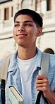 Walking, college student or man with book on campus, biology major or academic course for education. Outdoor, smile or person with learning material for knowledge, class journey or study life science