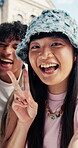 Happy woman, face and selfie with friends in city, profile picture and memory for social media post. Outdoor, portrait and people with peace sign, photography and bonding with smile on weekend break