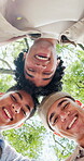 Men, face and bonding with friends in nature, hangout and laughing with group on weekend and outdoor. Happy people, portrait and solidarity with embrace on break, low angle and connection at park