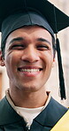 Face, college student or man with smile for graduation, achievement or pride for education milestone. Campus, portrait or learner with happiness for qualification ceremony, academic success or laugh