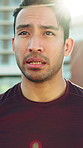 Thinking, man and athlete in city, tired and burnout in morning or breathing with fatigue on street. Outdoor, reflection and person with exhaustion, fitness and runner with determination and flare