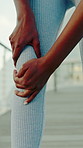 Fitness, hands and woman in city with knee pain, injury or accident for workout mistake. Health, athlete and female person in town with torn ligament, arthritis or fibromyalgia for outdoor exercise.