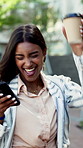 Happy woman, dancing and phone with coffee in city for music, audio streaming or vibe. Excited, female person or listening with smile or drink for good news, sound app or celebration in an urban town