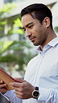 Real estate, typing and man in city, tablet for building permit and email notification for schedule. Outdoor, realtor or person with tech for property review, internet and research for urban planning