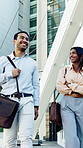 Walking, talking and business people in city for commute, travel and trip to office together. Corporate, professional and man with woman in town for discussion, conversation and chat in morning