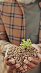 Black man, agriculture and face with soil in greenhouse for seedling, sustainability or food production. Mature person, dirt and check ground with farming, sprout or portrait with compost in Nigeria