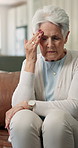 Senior, stress and woman with headache on sofa from hypertension, discomfort and chronic disease. Health risk, elderly person and anxiety in home with tension migraine, high blood pressure or massage