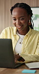Typing, laptop and black woman in office, creative or review project with logo design revision. Computer, happy person and graphic designer in business for email, layout research or brand identity