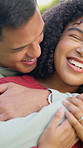 Happy, hug and couple in nature with love, care and bonding on outdoor date together on holiday. Smile, trust and man embrace woman for connection in marriage with commitment on anniversary vacation.