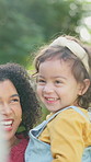 Happy, mother and girl in park, funny and bonding together with holiday, support and calm. Family, mama and daughter with love, care and parent with growth development, laughing and wellness
