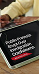 Hands, person and meeting with tablet screen in office for breaking news, immigration and public protest. Team, digital and live update on civil disobedience, social activism and deportation outrage