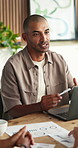 Business, team and man talking in meeting for social media marketing, analysis or idea proposal. Laptop, discussion or person in office for advertising suggestion, engagement traffic or data planning