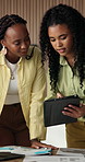 Women, talk and meeting in office with tablet, planning document and brainstorming for web design. People, collaboration and digital designer in business with tech, paperwork or site development idea