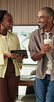 Review, laugh or people in office with tablet, funny conversation or feedback on marketing pitch. Happy, joke or creative director with tech, workplace humor or proposal insight for brand awareness.