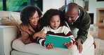 Family, relax and bonding with tablet in living room for movies, streaming or internet show for subscription. Parents, girl and tech for entertainment, video and app in home for weekend together