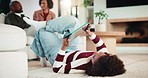 Girl, child and relax in home with tablet, play online game and entertainment with family on weekend. Kid, chill and gaming website on living room floor with digital tech, connectivity and browsing.