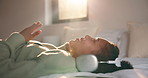 Music, singing and happy girl with headphones in bed for audio streaming or podcast in home. Child, kid or teenager lying with smile for online subscription, sound app or song playlist in bedroom