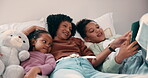 Bedroom, tablet and mother with kids relaxing, bonding or watching movie in home. Happy woman, family or mom with daughter on digital app for film choice, scroll and streaming service on weekend