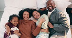 Laughing, above and face of family in bedroom for bonding, support and weekend break. Happiness, connection and love with parents and children lying in bed home for trust, relax and funny joke