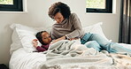 Fever, thermometer and mother with daughter in bedroom for sick monitor, healthcare and disease check. Medical, illness and virus infection with woman and child in family home for recovery and trust