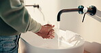 Health, washing hands or person in house with soap, bacteria removal or sanitation in wellness routine. Safety, clean or woman with disinfectant, germ protection or hygiene habit in virus prevention.