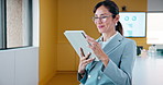 Businesswoman, smile and scroll in office with tablet, email and good news for data analysis report. Happy, mature person and analyst in agency with tech, glasses and graphs for company stats goals.