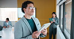 Businessman, thinking and typing in office with tablet, remember idea and plan for marketing analytics. Coworking, person and vision by window with tech, graphs or statistics for advertising insights