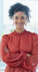 Arms crossed, face and smile of business woman in office for career in accounting or finance. About us, friendly and happy with professional accountant in financial workplace for wealth management