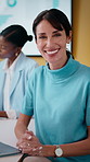 Face, confidence or businesswoman with laptop in meeting, investment research or forecasting career. Portrait, pc or mature analyst with economic data for financial planning, happy or laugh in office