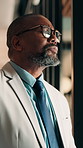 Thinking, business and black man in office for investment decision, proposal and finance strategy. Corporate, mature and person with ideas, problem solving and solution for financial opportunity