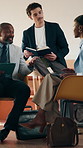 Laptop, notebook and business people in office with tablet for planning with finance report. Collaboration, technology and team of financial advisors with diary for investment risk in workplace.