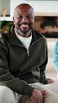 Relax, man and happy with face on sofa for weekend break, peaceful morning and unwind with family. Chill, mature black person and laughing in living room for comfortable afternoon, home and day off