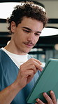 Nurse, man and writing in hospital with tablet, review and online research for medical internship. Person, healthcare intern and digital notes in clinic with tech, stylus and reading for case study.