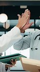 Healthcare, doctors and high five with tablet in hospital, talk or happy with treatment plan on web. Clinic, health professional and mature people with tech for medical success, team and celebration